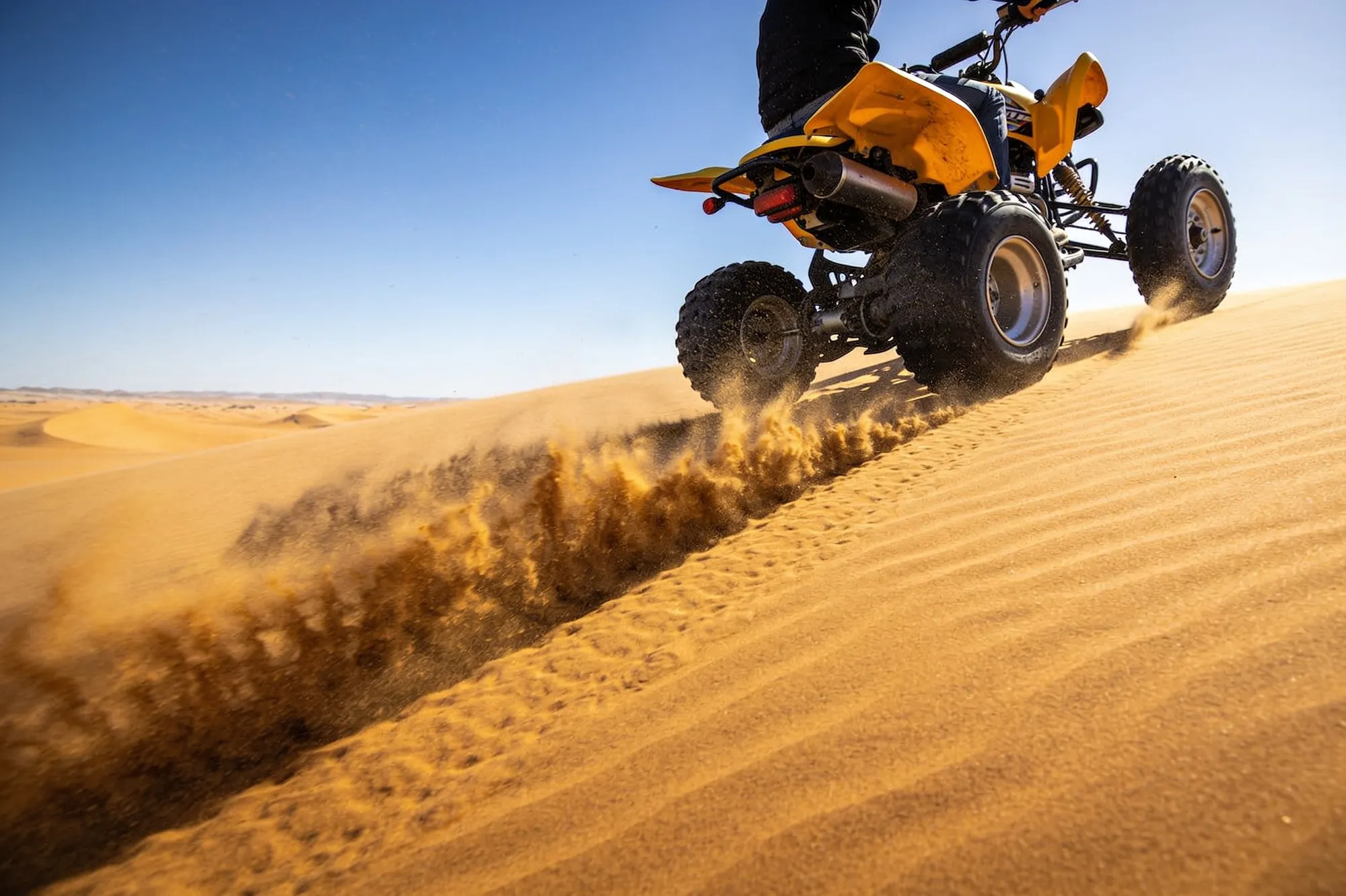 Photo: Quad biking across the dunes