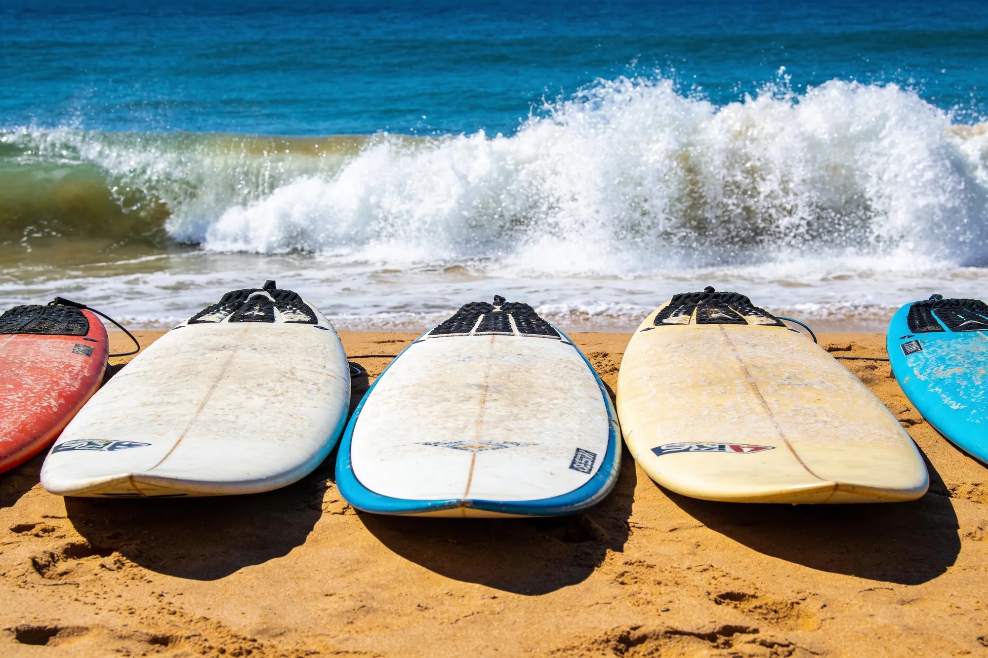 Photo: Boards lined up on the sand
