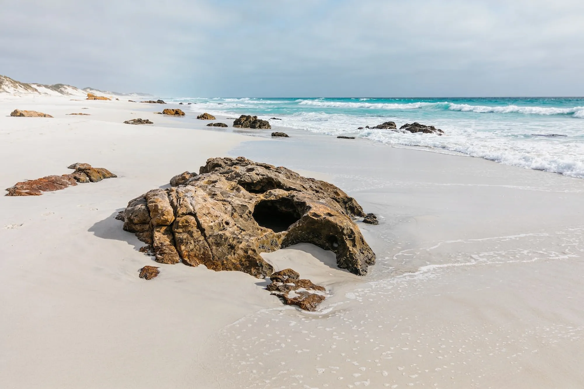 Photo — An empty beach in the marine reserve
