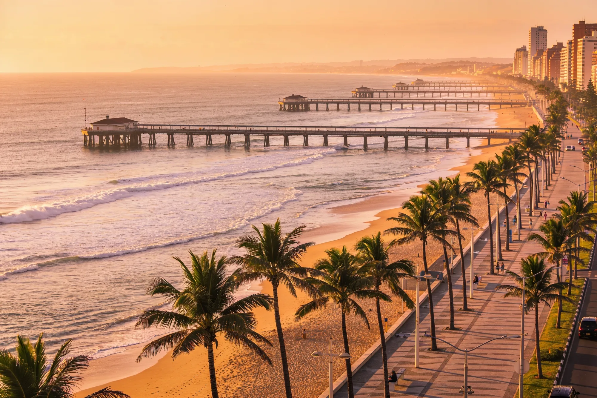 Photo — The promenade and beaches at sunrise