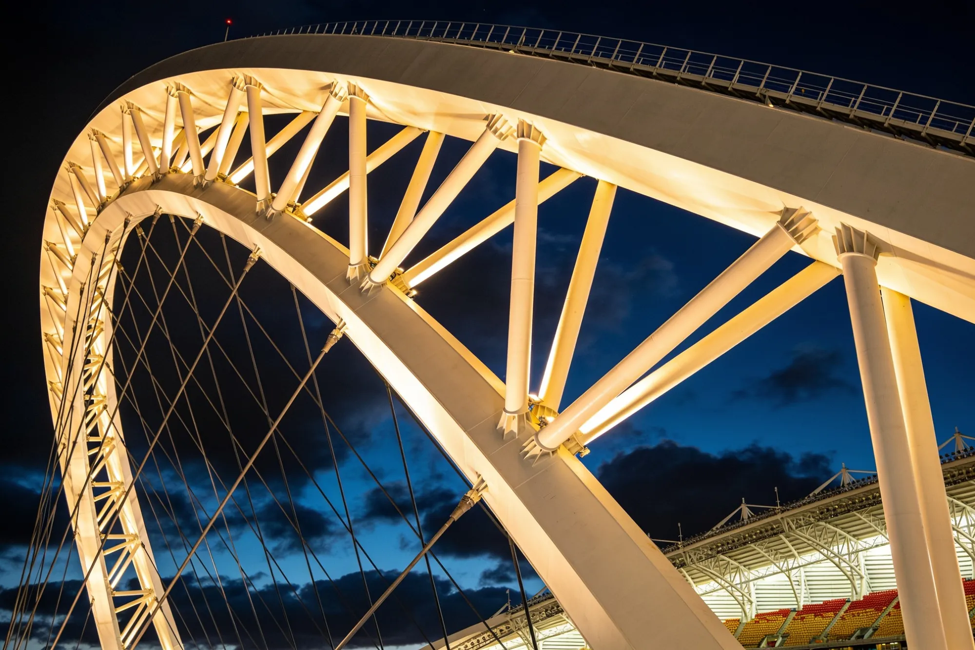 Photo — The lit arch at night